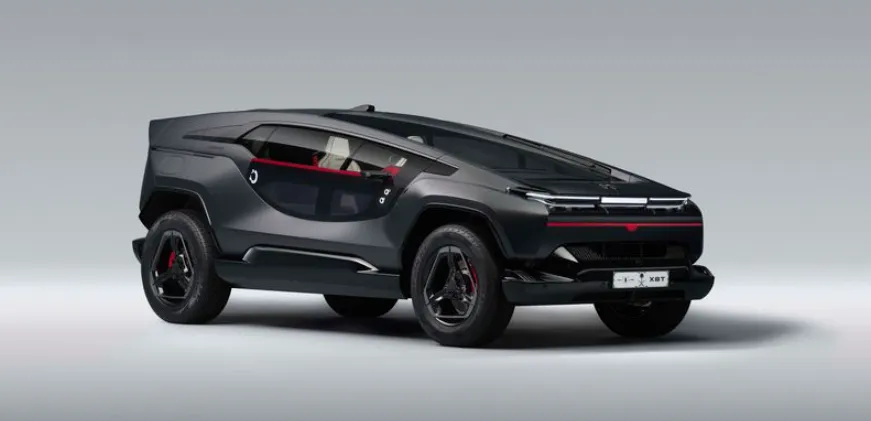 Futuristic black SUV with unique design and red accents, displayed against a simple gray background.